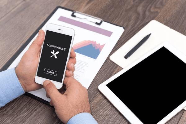 Phone user looking at his maintenance phone
